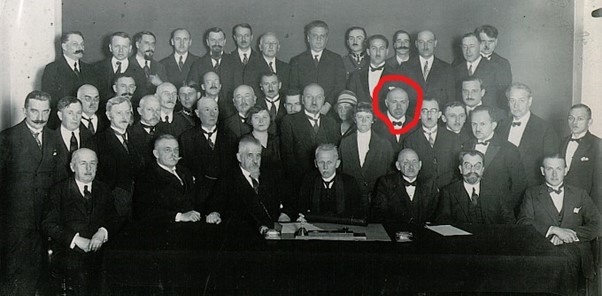 Group photo of 45 people in formal dress